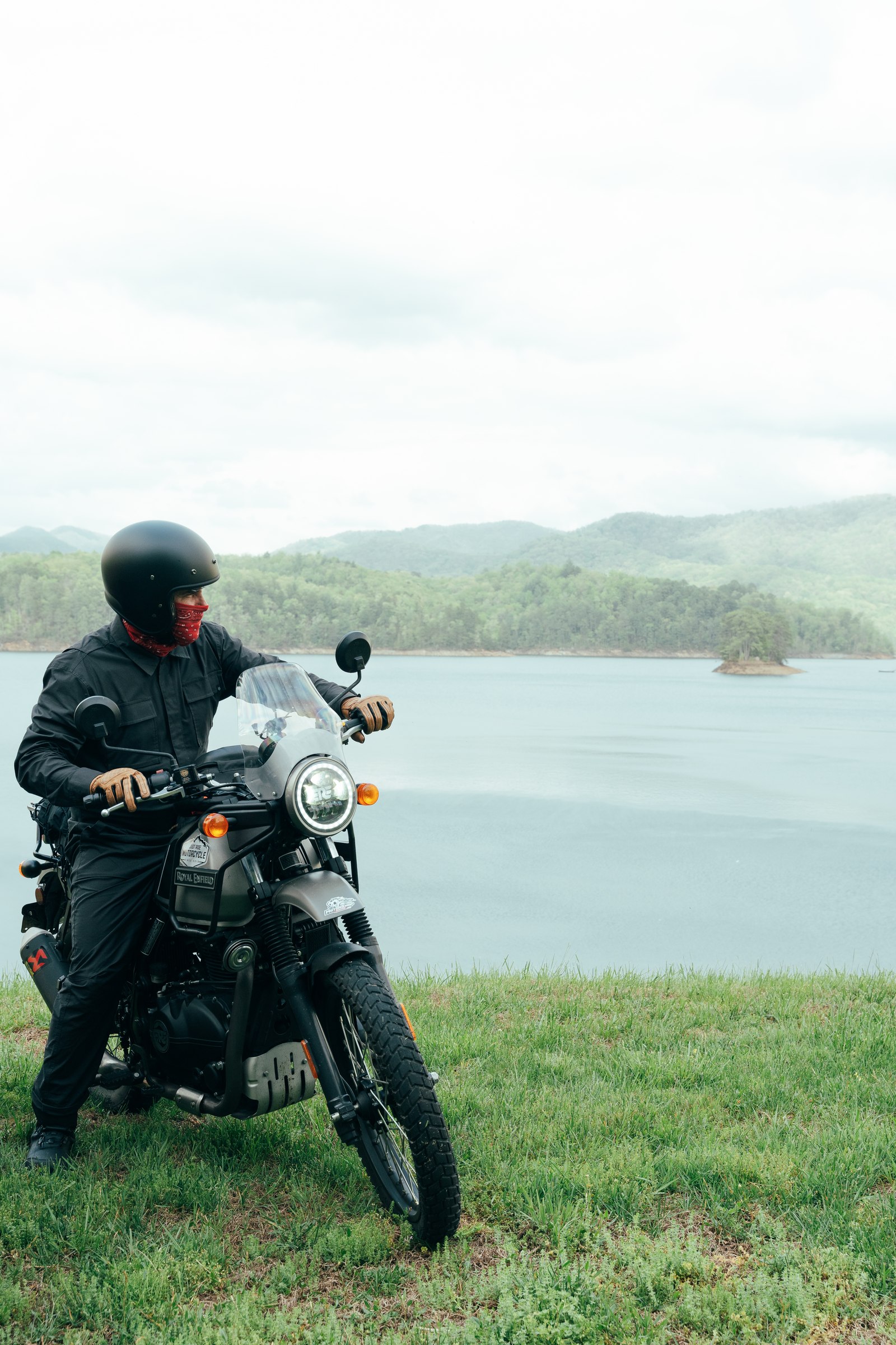 Eagles and Dragons tour — rider overlooking a Blue Ridge lake